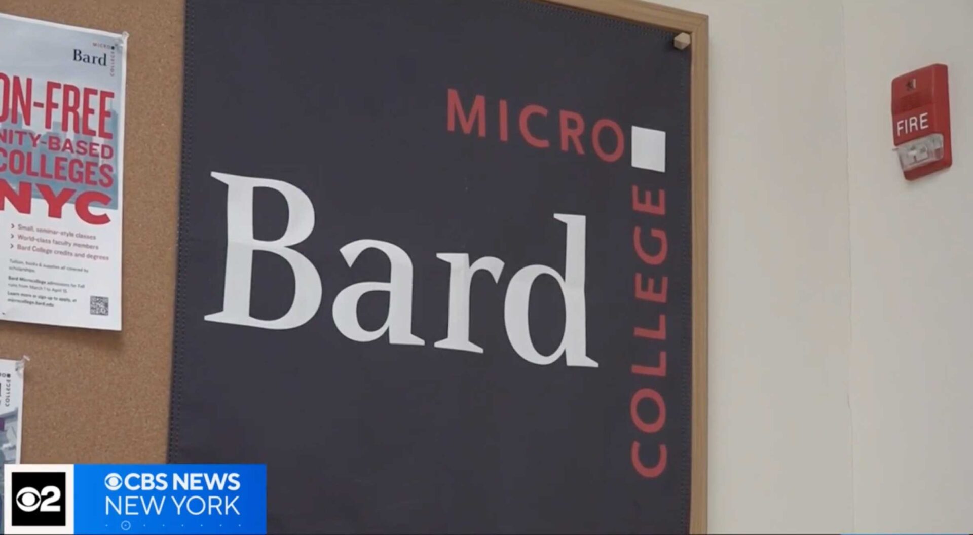 Video still showing the microcollege logo and posters pinned to a bulletin board.